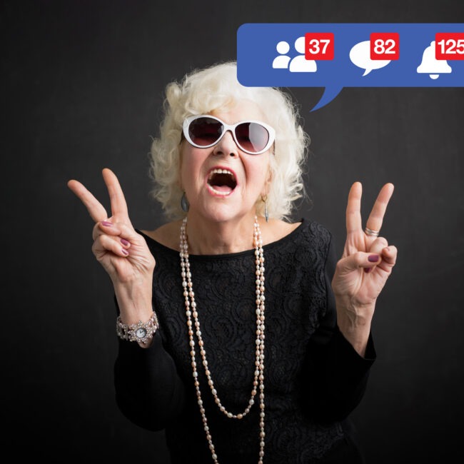 Elderly woman enjoying high social media engagement, driven by BRANDSHAPE’s targeted social media marketing services."