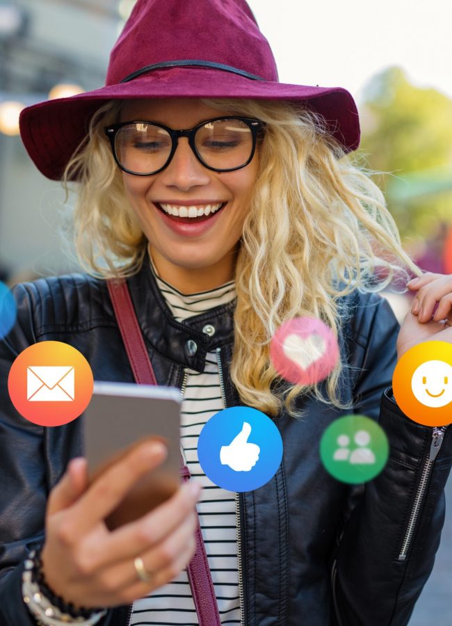 The young woman is thrilled about her social media growth, actively boosting likes, follows, and attracting more views, traffic, and attention to her brand.